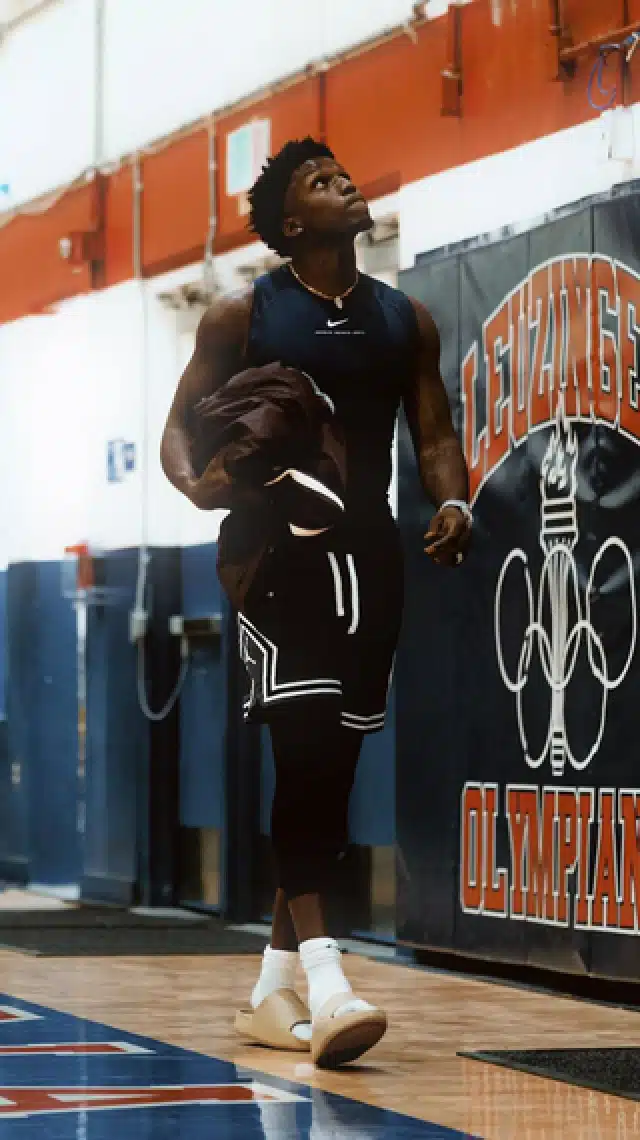 a man walking in a gym